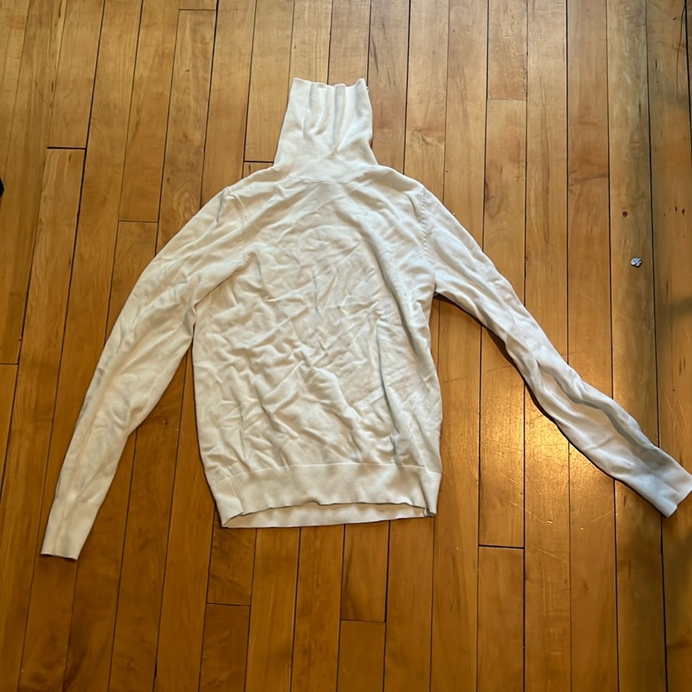 Long sleeved cream turtleneck
